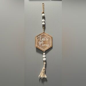 NWOT Hanging wooden beaded tassel sign “Let’s get cozy” approx 20” (b)